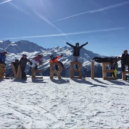 Students on a mountainside during the ski trip